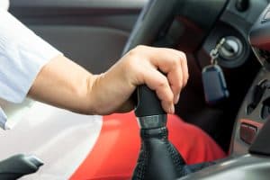 hand-holding-the-shift-lever-in-car-with-manual-tran