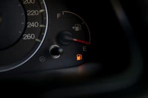 empty-fuel-warning-light-in-car-dashboard-fuel-pump-icon-gasoline-gauge-dash-board-in-car-with-digital-warning-sign-of-run-out-of-fuel-turn-on-low-level-of-fuel-show-on-speedometer-dashboard