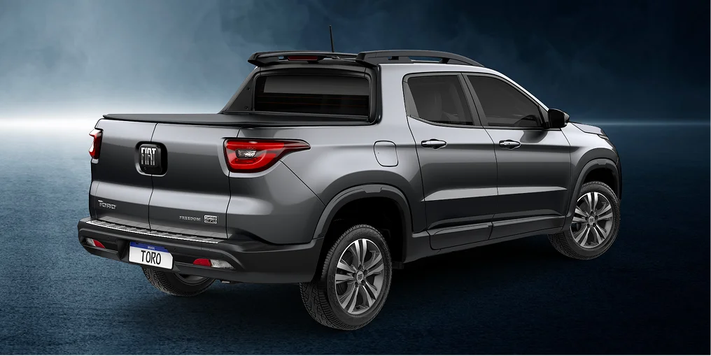 Lateral externa traseira do carro Fiat Toro Freedom 1.3 2024